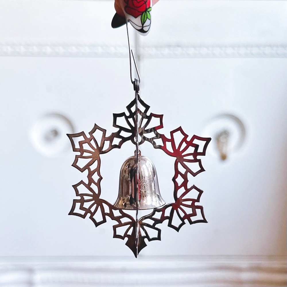 Vintage Reed & Barton silver spinning snowflake  & bell Christmas ornament